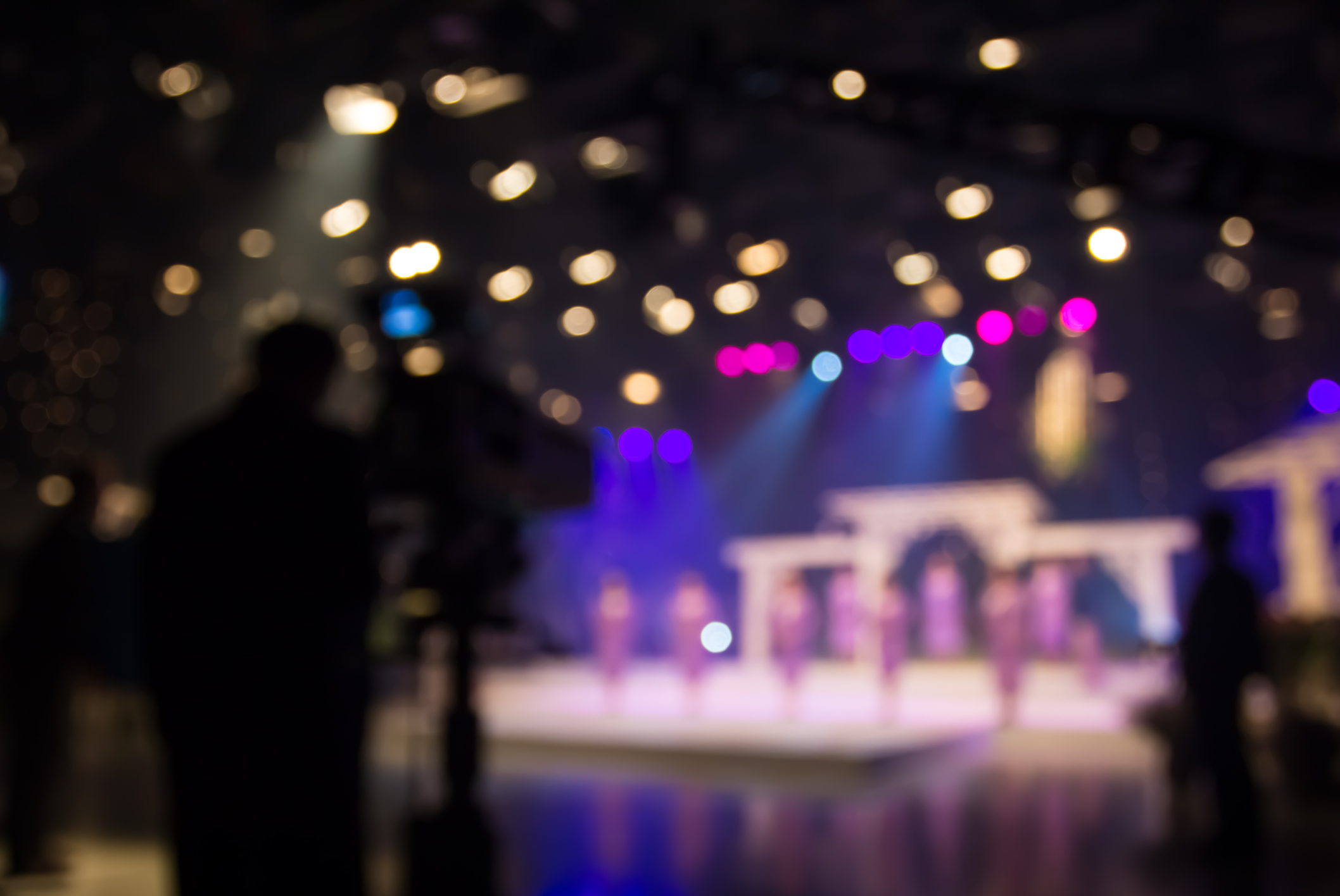 Actress or singer in studio of television station with camera